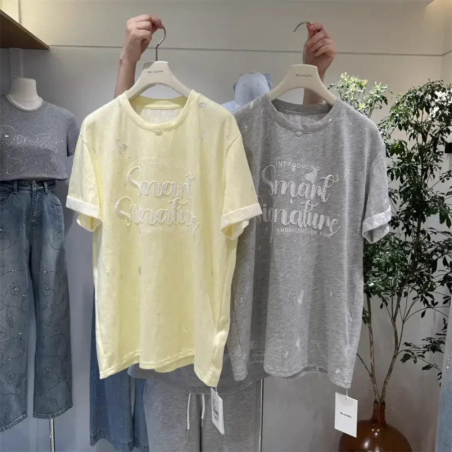 A137 - SS26 Designer Series: Intricate Lace & Embroidery Distressed Oversized Tee