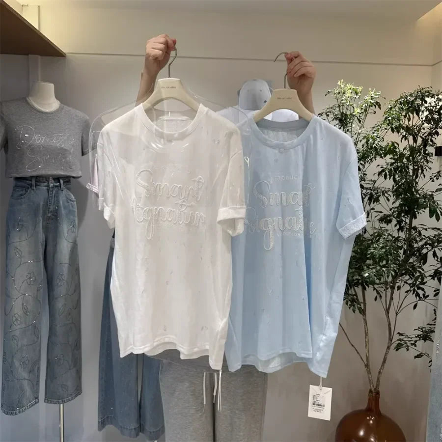 A137 - SS26 Designer Series: Intricate Lace & Embroidery Distressed Oversized Tee